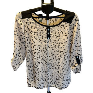 LAVISH MATERNITY CREAM AND BLACK TOP WITH BOWS